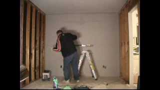 Putting Up The Wall How to Drywall Sheetrock Gypsum [upl. by Anawk]