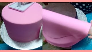 COVERING CAKE WITH FONDANT  BARBIE CAKE DECORATING [upl. by Gerdeen]