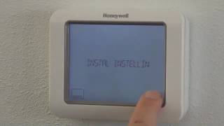 Fabrieksprogramma instellen Chronotherm Touch Modulation  Honeywell Home [upl. by Drofniw]