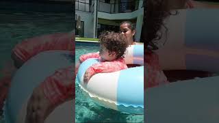 Brother teaches little sister how to swim in pool shorts [upl. by Malinin]