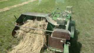 Baling Hay With The John Deere 24T Square Baler And 4320 [upl. by Ipoillak]