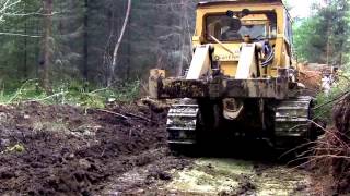 Caterpillar D7 F bulldozing logging road [upl. by Vedetta246]