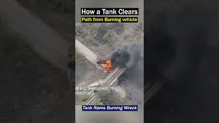 Ukrainian Tank Pushes Burning Wreckage to Clear Road [upl. by Salchunas375]