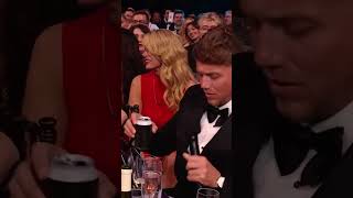 Kylie Minogue drinks out of a shoe with BRITs host Roman Kemp 🫢 kylieminogue brits ytshorts [upl. by Nylrebma]