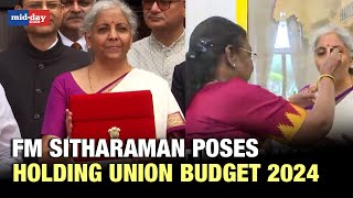 Union Budget 2024 FM Sitharaman poses holding Union Budget 2024 outside Finance Ministry office [upl. by Chloris193]