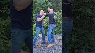 Best Defense Against a Hook Punch  Street Fight Self Defense shorts [upl. by Connelley]