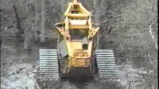 Tracked Bell Feller Buncher swamp logger [upl. by Gnanmos421]