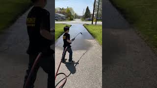 Learning how to spray driveway sealer driveway drivewaysealing sealcoating fatherandson [upl. by Lyn]