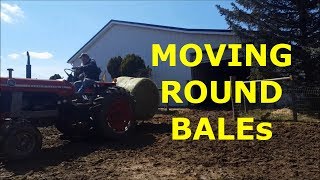 Using 3 Point Carry All To Move Round Bales [upl. by Oretna272]