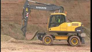 Wheeled Excavator Hitachi Zaxis 210W  Working In Road Construction [upl. by Eireva]