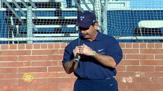 The best way to grip a bat for Softball with coach Mike Candrea [upl. by Tiena]