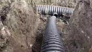 Installing drain tile in the field [upl. by Fauman376]