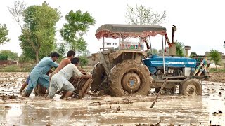 Ford 3610 Stuck in Mud Crazy people Trying to get out From Field [upl. by Esyahc]