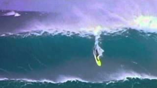 HUMPBACK WHALE BREACHES BEHIND SURFER on GIANT WAVE [upl. by Ellevel]