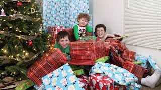 KIDS OPENING CHRISTMAS PRESENTS  Christmas Morning 2017 [upl. by Prowel429]