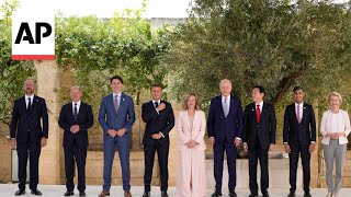 G7 leaders pose for photographers as they prepare to tackle global issues [upl. by Farley]