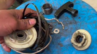 How To o Fix a Pull Starter Recoil Spring and Replace a Stuck or l Brush Cutter Starter Repairing [upl. by Danforth]