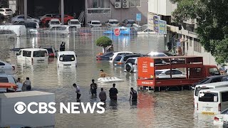 Videos show Dubai streets flooded after record rainfall inundates UAE [upl. by Anelam]