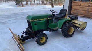 Snow Plowing Fun on a John Deere 400 [upl. by Ennyleuqcaj]