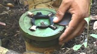 Cambodian shows how to disarm a mine [upl. by Nickolas]