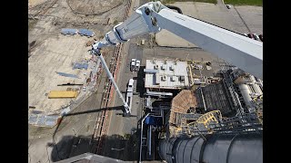 300ft aerial lift at the power plant Installing 6 antennas on smokestacks Daily operated rentals [upl. by Eelyma396]