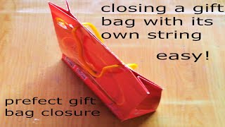 easy closing a gift bag with its own string perfect gift bag closureclose gift bag with handles [upl. by Dail]