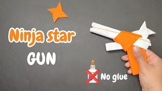 Paper gun origami without glue  Making a paper gun that shoots ninja stars with trigger [upl. by Woodsum]