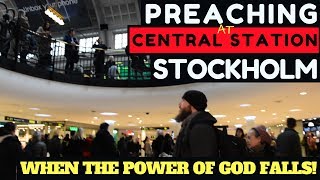 Street preaching in Stockholm Swedens Central Station when the power of God falls [upl. by Tanah837]