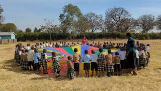 Playing parachute games with the Nursery and Reception children1 [upl. by Hertzog]