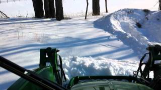 John Deere 4720 clearing 40quot of heavy snow [upl. by Kaufmann571]