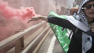 Protesters Light Smoke Bombs and Scale Fences as Thousands March in NYC [upl. by Surad736]