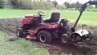 Scabbin A Rototiller On The Garden Tractor [upl. by Aryam438]