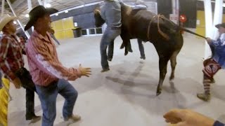 Angry bull escapes into crowd and drags rodeo bullfighters [upl. by Eidualc]