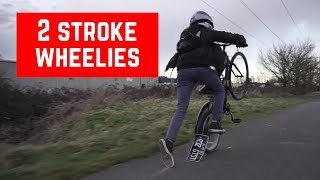 2 Stroke Motorized Bike Wheelies [upl. by Ahsenid]