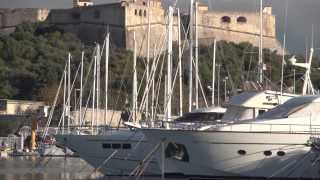 Antibes France Old Town with ancient church narrow lanes food market pedestrian zone marina [upl. by Akiram]