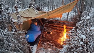 Winter Camping in Snow Storm with Survival Shelter amp Bushcraft Cot [upl. by Gloriane]