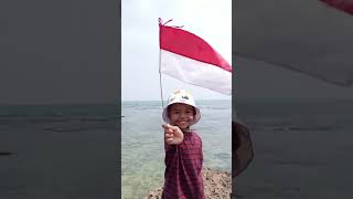 abil kibarkan bendera di pinggir pantai teriak merdeka🇲🇨 shorts [upl. by Ahsitniuq]