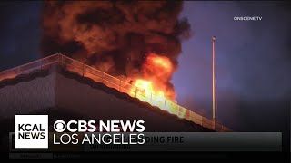 Firefighters search for possible victims as historic San Bernardino building goes up in flames [upl. by Eladroc]