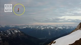 Tightrope Artist Walks Across Austrian Alps [upl. by Remde660]