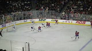 Toronto Marlies Topi Niemelä pushes Laval Rockets Xavier Simoneau onto Marlies goalie Joseph Woll [upl. by Ahsilif]