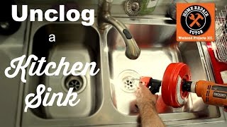 How to Unclog a Kitchen Sink Drain  by Home Repair Tutor [upl. by Debo616]