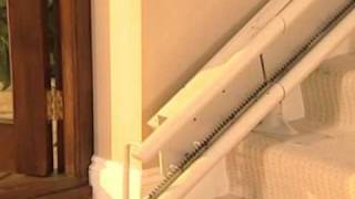 Stannah 260 Curved Stairlift  powered hinge down up video [upl. by Noek]