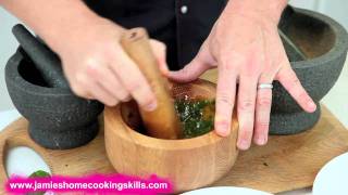 Jamie Oliver talks you through using a pestle and mortar [upl. by Aisanat]