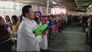 Mexican priest uses watergun to spray holy water [upl. by Niklaus598]