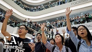 In Hong Kong’s protests a song confronts Beijing [upl. by Noremak949]