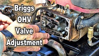 Adjust valves Bolens 450E lawnmower Briggs and Stratton engine [upl. by Boniface]