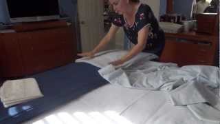 Folding and organizing bedding sheets [upl. by Silvan]