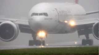 Emirates 777 landing in heavy rain BHX [upl. by Nelrah]