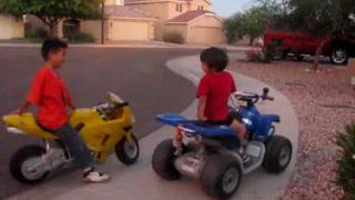 Motorcycle 4 year old on ATV 12 volts versus 7 year old on Motorcycle 36 volts [upl. by Wulf]