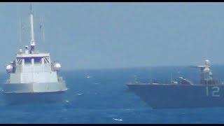 Watch as the US Navy fires warning shots toward an Iranian patrol boat [upl. by Leahci]